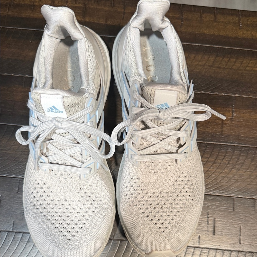 adidas ultra boost  Women's White Knit Running Sneakers with Light Blue Logo
